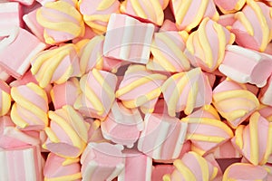 Colorful marshmallows as a background. Fluffy marshmallow texture close up, close up