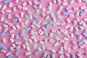 Colorful marshmallows pattern on blue background