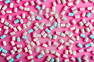 Colorful marshmallows pattern on pink background
