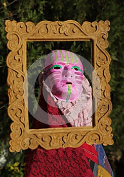 A colorful mask of theatrical  harlequin mask shot outdoor