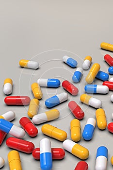 Colorful medicine capsules on light background