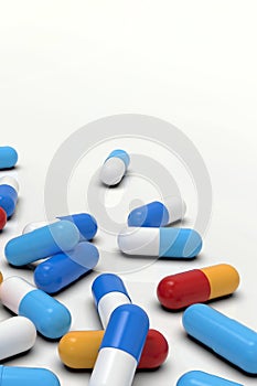 Colorful medicine capsules on light background, closeup