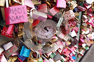 Colorful metal pad locks, symbol of eternal love.