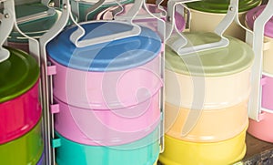 Colorful metal tiffin, food containers.