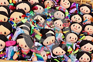 Colorful Mexican handmade traditional dolls in street market