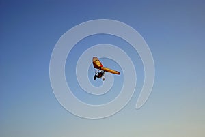 Colorful Microlight in Blue Sky