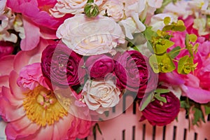 Colorful mixed bouquet with various spring flowers in floral decor, Colorful wedding flowers background . Mixed flower arrangement
