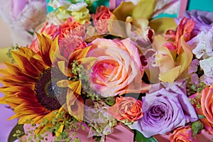 Colorful mixed bouquet with various spring flowers in floral decor, Colorful wedding flowers background . Mixed flower arrangement
