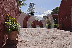 Colorful monastery with volcano in the background