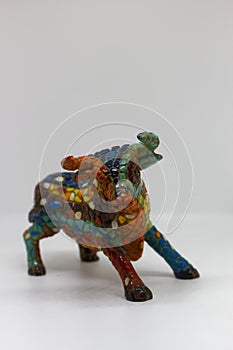 Colorful Mosaic Bull statue on white background