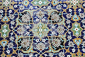 Colorful mosaic and ceramic tiles in the traditional Persian style on the wall Tomb of Sheikh Safi al-Din, Ardabil, Iran