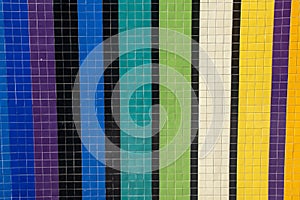 Colorful mosaic tiles on the wall. Abstract background and texture for design