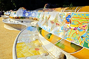 Colorful mosaic walls of Parc Guell, Barcelona, Spain photo