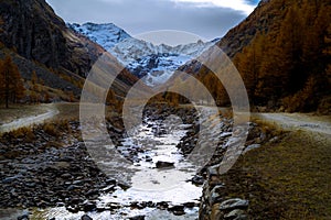 Colorful mountain landscapes, fall colors, mountains, sky and water