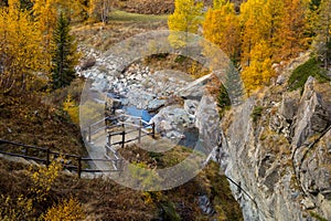 Colorful mountain landscapes, fall colors, mountains, sky and water