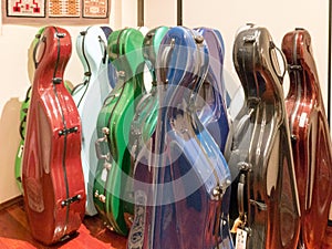 Colorful multicolor Cello Carrying Cases Standing On Display