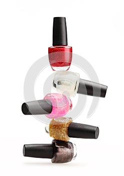 Colorful nail polish set on white background isolated