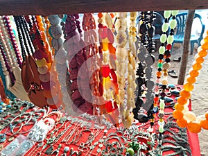 Colorful necklaces in Anjuna market, Goa, India