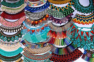 Colorful necklaces and bracelets made of beads photo