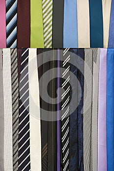 Colorful neckties hanging, fashion accessory