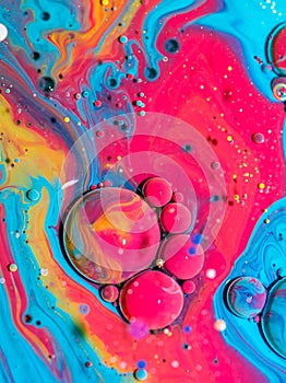 Colorful neon abstract paint liquid bubble background