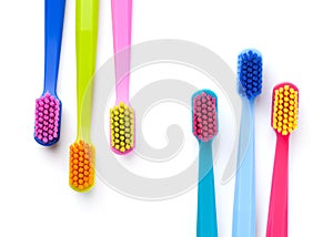 Colorful New Toothbrushes Isolated On White Background