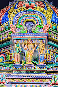 Colorful night view of indian gods sculpture at Sri Maha Mariamman Temple, also known as Maha Uma Devi temple, the public hindu t