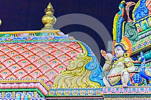 Colorful night view of indian gods sculpture at Sri Maha Mariamman Temple, also known as Maha Uma Devi temple, the public hindu t