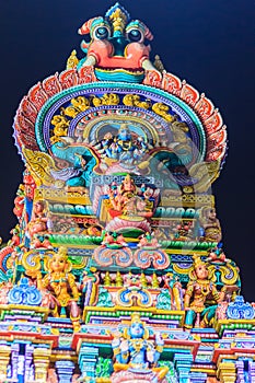 Colorful night view of indian gods sculpture at Sri Maha Mariamman Temple, also known as Maha Uma Devi temple, the public hindu t