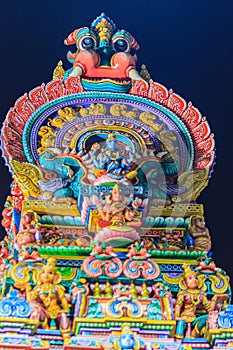 Colorful night view of indian gods sculpture at Sri Maha Mariamman Temple, also known as Maha Uma Devi temple, the public hindu t