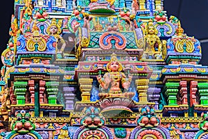 Colorful night view of indian gods sculpture at Sri Maha Mariamman Temple, also known as Maha Uma Devi temple, the public hindu t