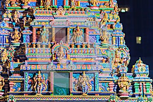 Colorful night view of indian gods sculpture at Sri Maha Mariamman Temple, also known as Maha Uma Devi temple, the public hindu t