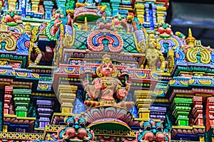 Colorful night view of indian gods sculpture at Sri Maha Mariamman Temple, also known as Maha Uma Devi temple, the public hindu t