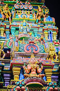 Colorful night view of indian gods sculpture at Sri Maha Mariamman Temple, also known as Maha Uma Devi temple, the public hindu t