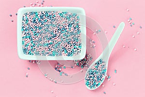 Colorful nonpareils cake sprinkles in rectangular bowls