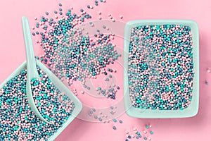 Colorful nonpareils cake sprinkles in rectangular bowls