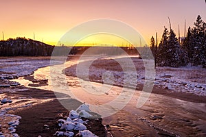 Colorful Norris Geyser Basin area trail during colorful sunset in Yellowstone National Park, Wyoming