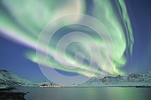 Colorful Northern lights are dancing in the sky