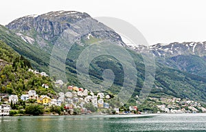 Colorful norwegian residential houses on the hill of Sorfjord, Odda, Hordaland county, Norway