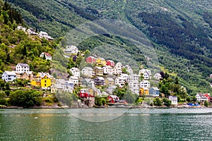 Colorful norwegian residential houses on the hill of Sorfjord, Odda, Hordaland county, Norway