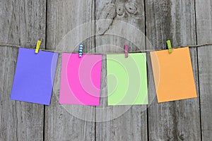 Colorful note cards hanging from clothesline