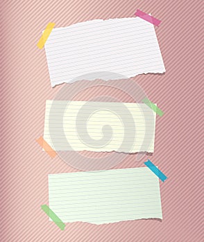 Colorful note, notebook, copybook paper sheets stuck with sticky tape on striped pattern