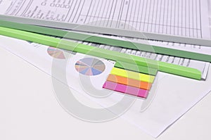 Colorful note pad with graphs and document files