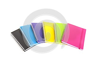 Colorful notebooks on white