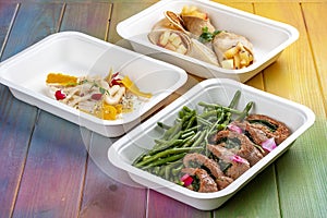 Colorful and nutritious meal kits prepared in eco-friendly containers for a convenient and healthy on-the-go meal