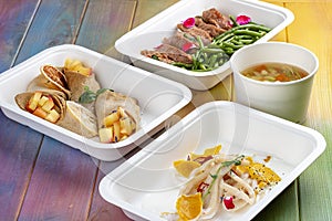 Colorful and nutritious meal kits prepared in eco-friendly containers for a convenient and healthy on-the-go meal