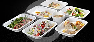 Colorful and nutritious meal kits prepared in eco-friendly containers for a convenient and healthy on-the-go meal