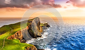 Colorful ocean coast sunset at Neist point lighthouse, Scotland