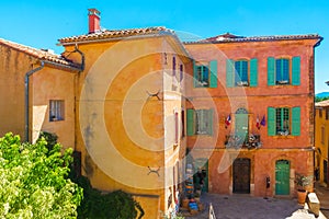 Colorful and ochre houses in the Roussillon village, Provence, France