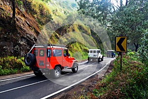 Colorful off-road cars in the Bromo mountains, East Java, Indonesia